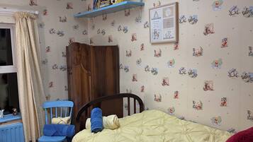 4 bedrooms, desk, iron/ironing board, travel cot