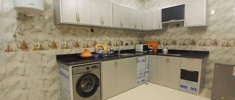 Fridge, microwave, oven, cookware/dishes/utensils