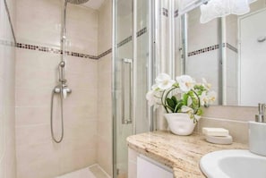 Hair dryer, towels, soap, shampoo