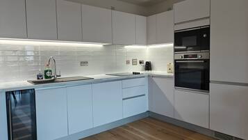 Apartment | Private kitchen | Fridge, microwave, oven, stovetop