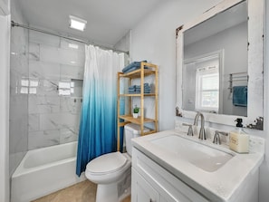 Hair dryer, towels, soap, shampoo