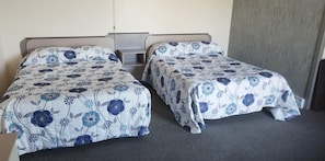 Comfort Quadruple Room, 2 Double Beds | 1 bedroom, desk, laptop workspace, blackout drapes