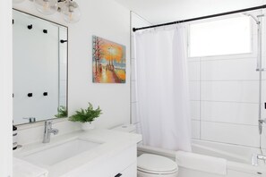 Hair dryer, towels, soap, shampoo