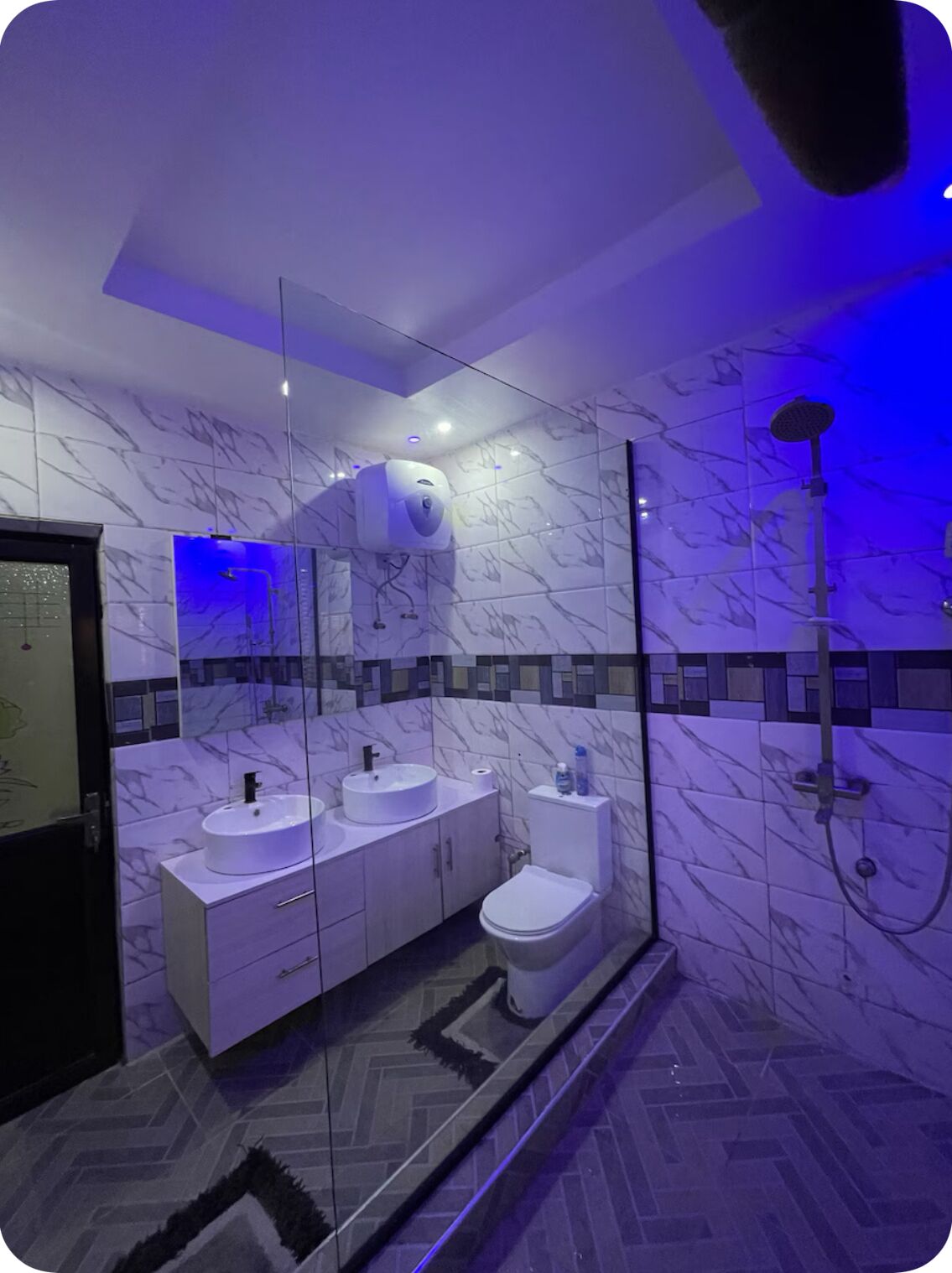Shower, towels, soap, toilet paper