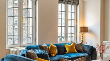 Superior Apartment, 2 Bedrooms | Living area | 40-inch LCD TV with digital channels