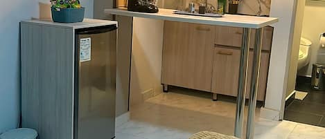 Standard Quadruple Room, Non Smoking | Private kitchenette