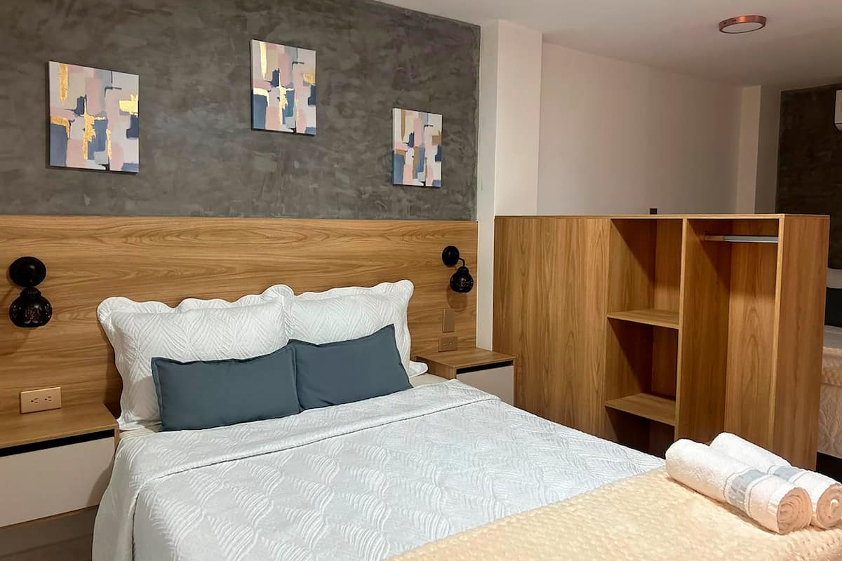 Premium bedding, down duvets, memory-foam beds, individually furnished