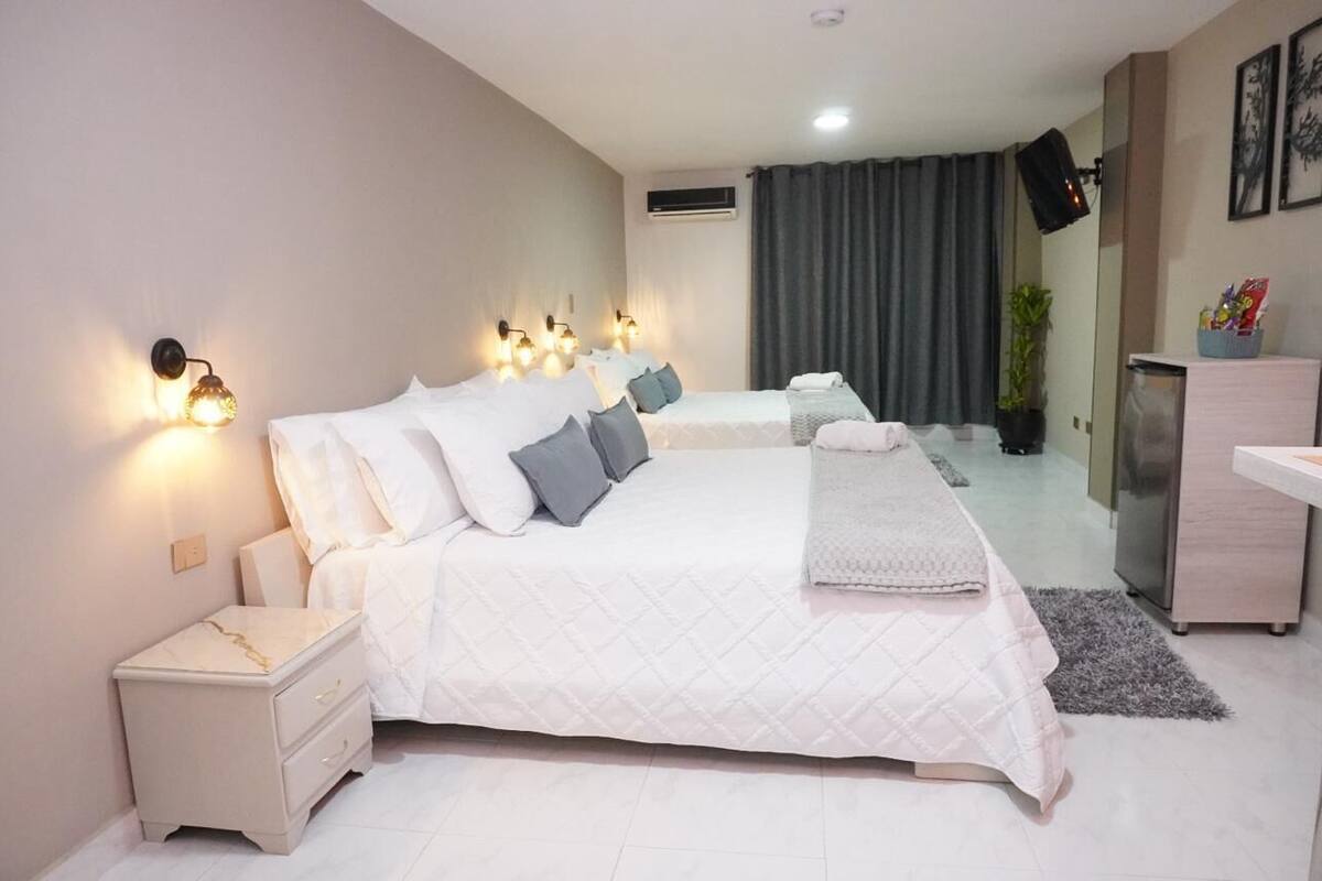 Familie studio | Luxe beddengoed, donsdekens, bedden met traagschuimmatrassen