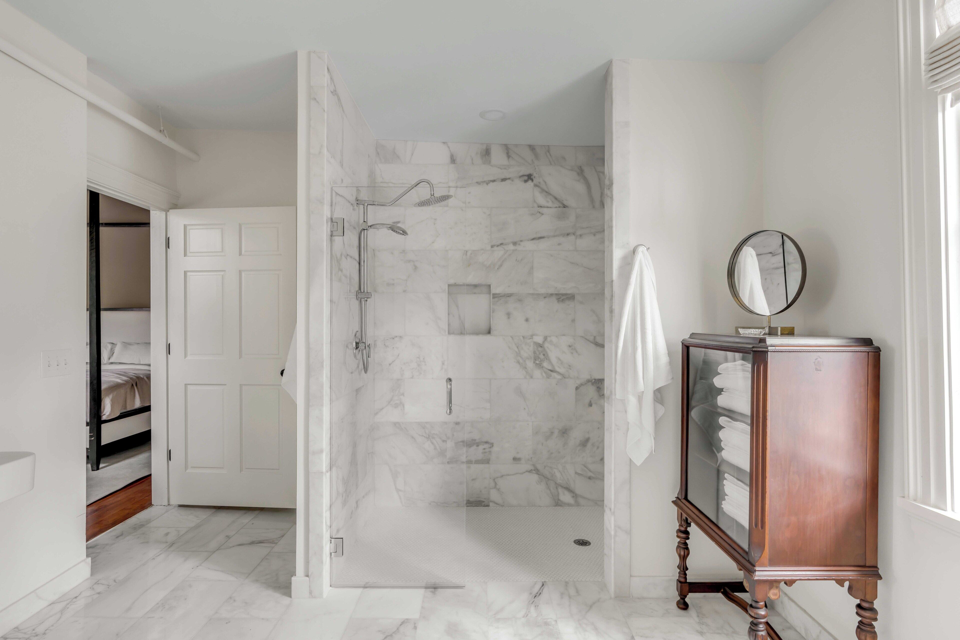 Luxury Suite | Bathroom | Shower, rainfall showerhead, hair dryer, bathrobes
