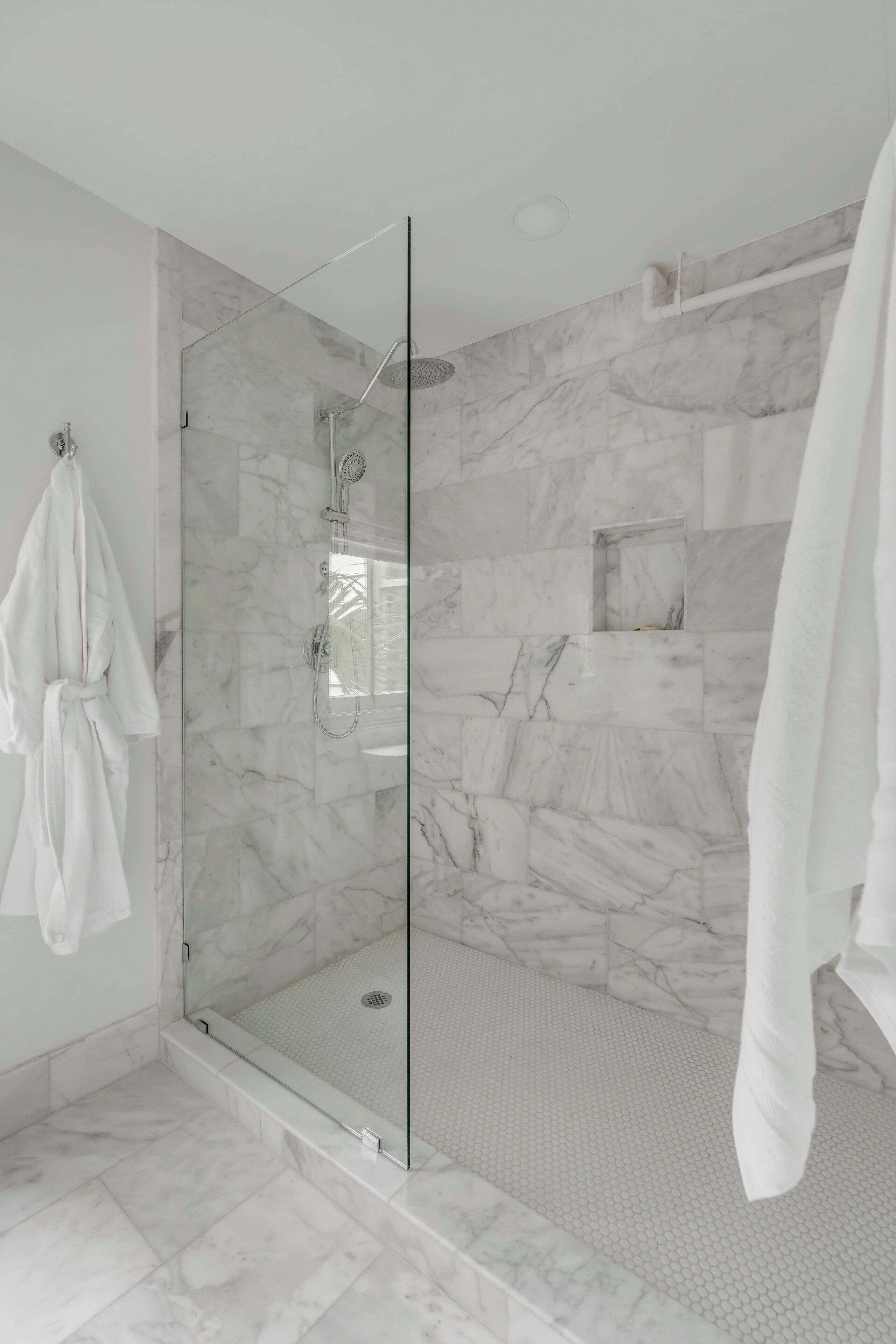 Luxury Suite | Bathroom | Shower, rainfall showerhead, hair dryer, bathrobes