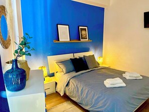 2 habitaciones, tabla de planchar con plancha, cuna de viaje y wifi 