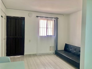 Apartamento | Área de estar | TV de tela plana