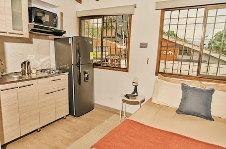 Apartment | Private kitchen | Mini-fridge, microwave, cookware/dishes/utensils
