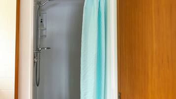Family Apartment, 1 Bedroom, Non Smoking, Refrigerator & Microwave | Bathroom | Shower, hair dryer, towels, soap