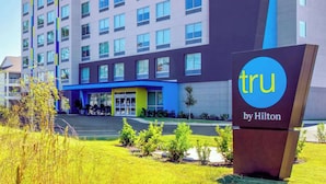 A modern hotel building with a prominent 'tru by Hilton' sign. - Tru By Hilton Panama City Beach (Panama City Beach)