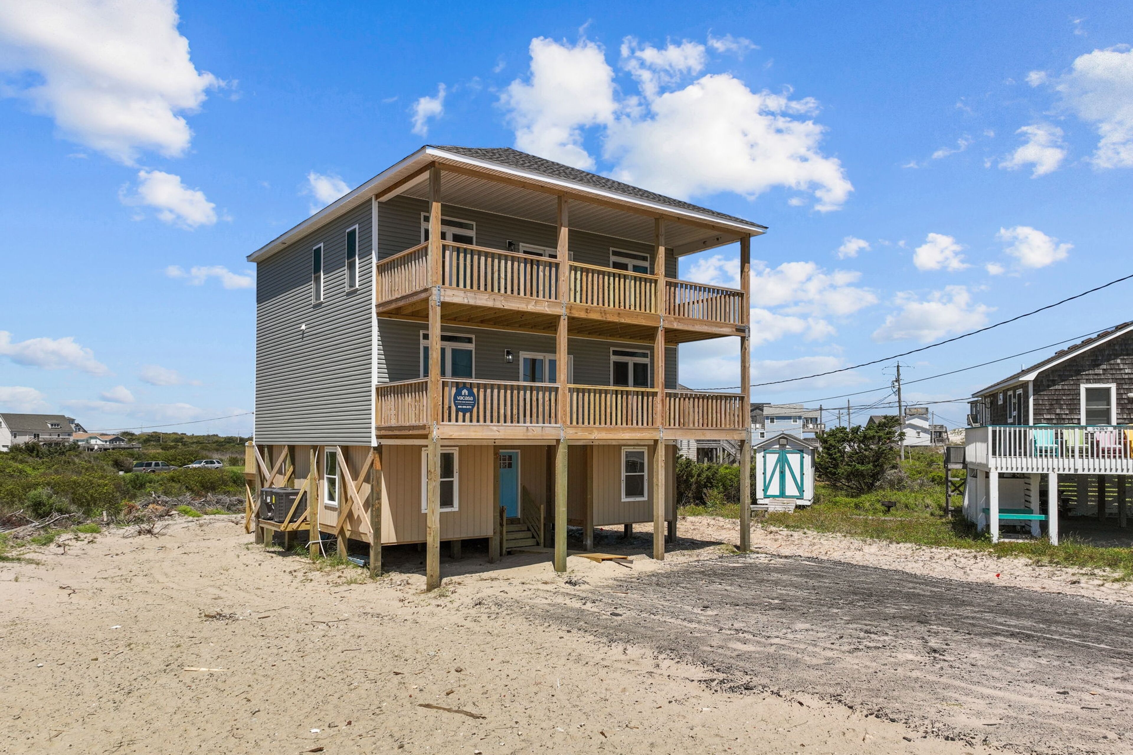 Dog-friendly home with an ocean view, deck, private hot tub, & pool access
