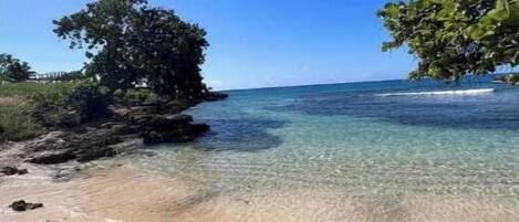 On the beach, sun-loungers, beach towels
