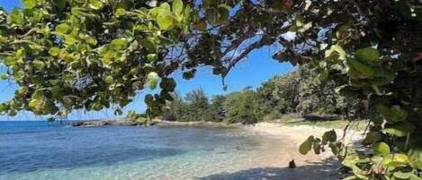 On the beach, sun-loungers, beach towels