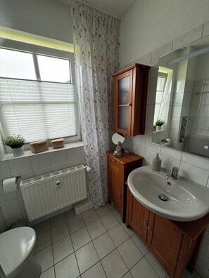 Hair dryer, towels, soap, shampoo