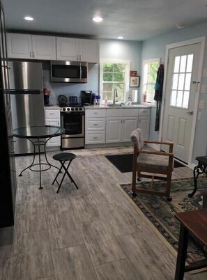 Fridge, stovetop, cookware/dishes/utensils