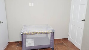 A small, enclosed space with a mesh top and a solid bottom, likely a utility or storage area. - Spacious full equipped in quiet area w/terrace B (Willemstad)