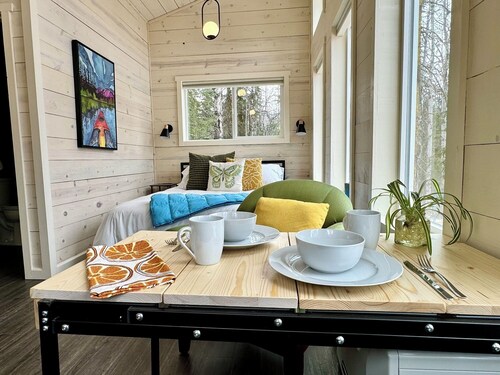 Experience serenity in a deluxe tiny house amid the Eklutna Valley's beauty.