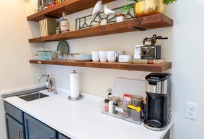 Fridge, microwave, coffee/tea maker, toaster