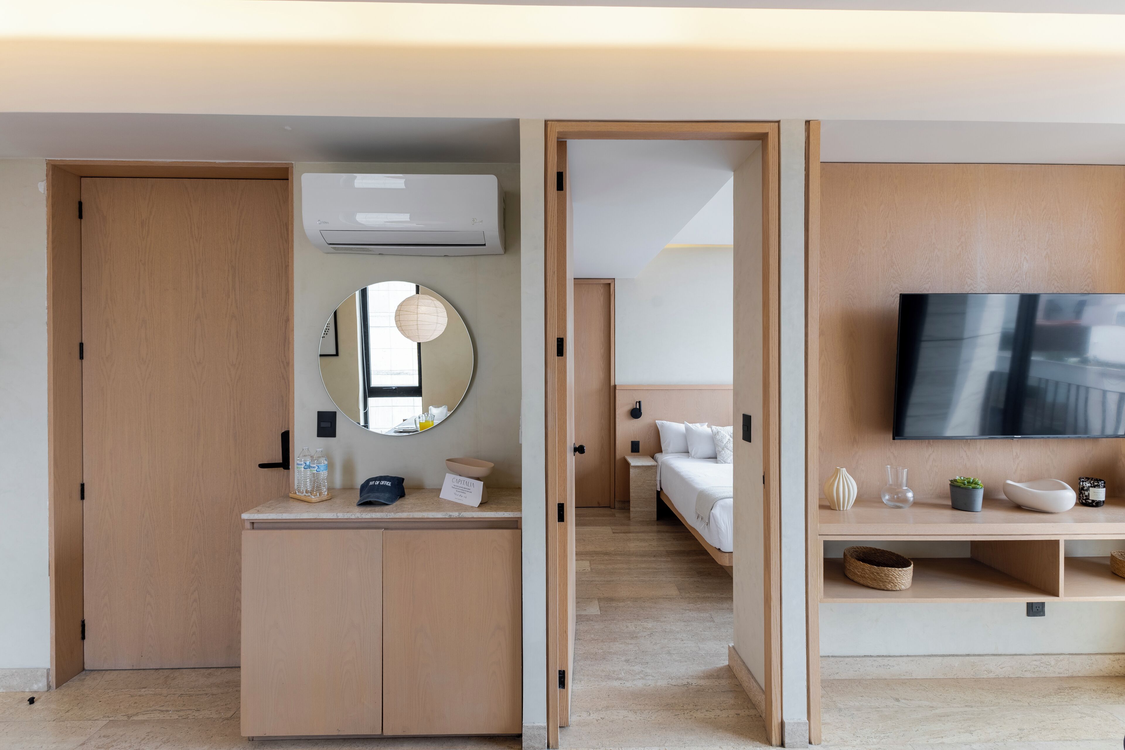 Deluxe Apartment, Balcony, City View | Living area | 40-inch flat-screen TV with cable channels