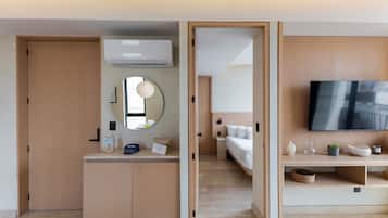Deluxe Apartment, Balcony, City View | Living area | 40-inch flat-screen TV with cable channels