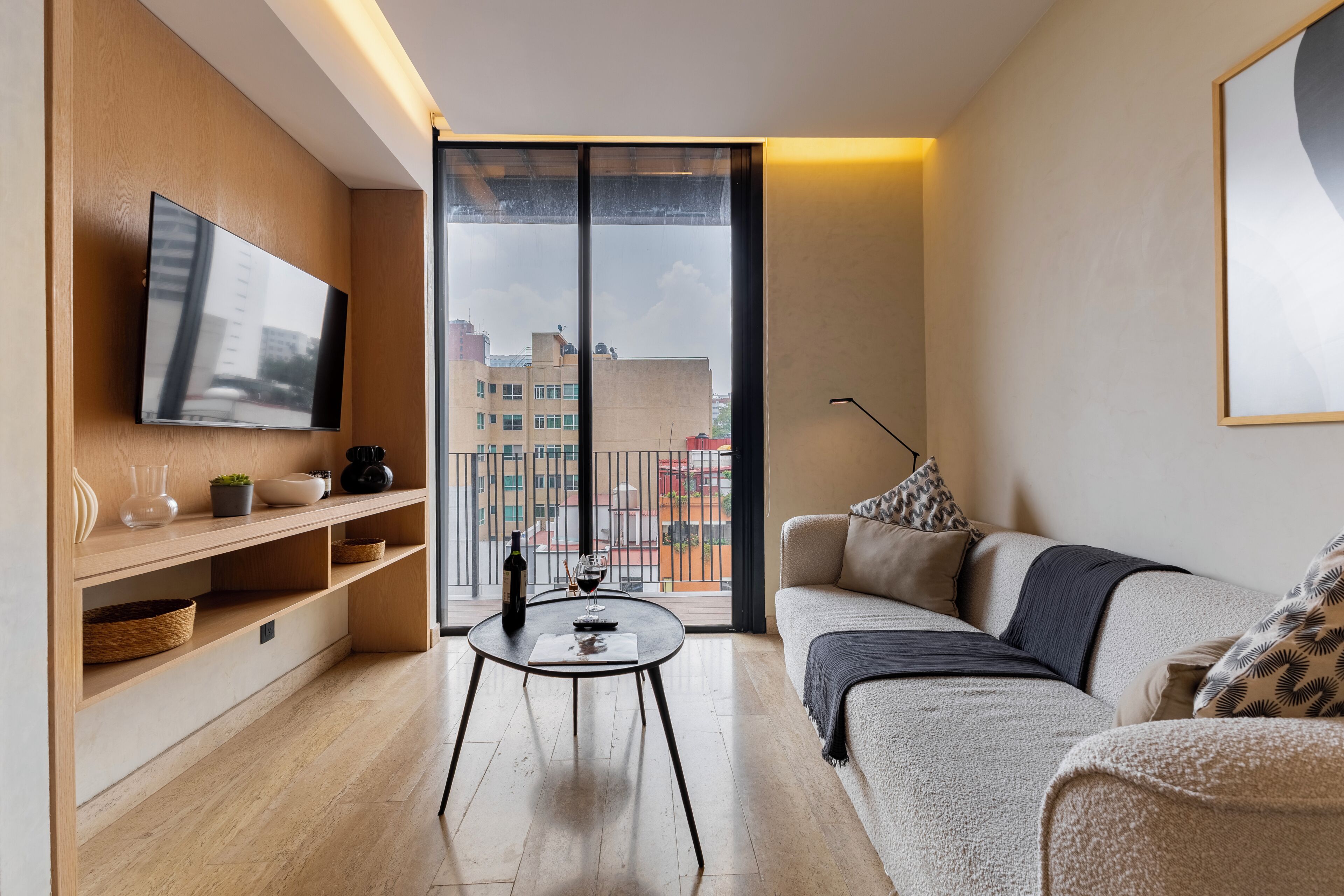 Deluxe Apartment, Balcony, City View | Living area | 40-inch flat-screen TV with cable channels