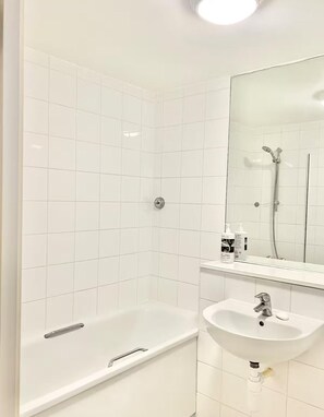 Hair dryer, towels, soap, shampoo