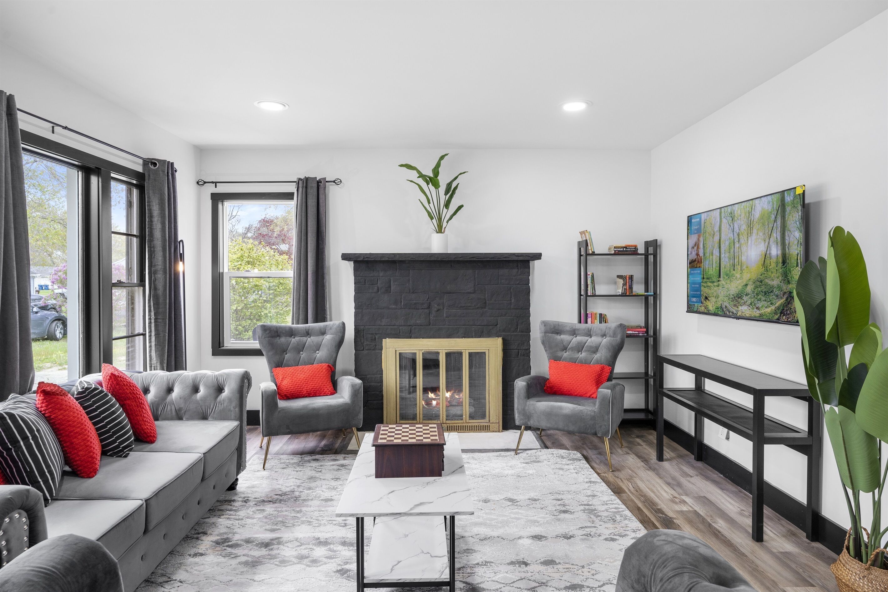 Smart TV, fireplace, foosball, books