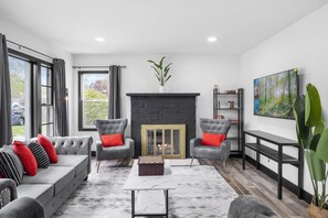 Smart TV, fireplace, foosball, books