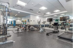 Stay fit on the go with our fully equipped gym featuring treadmills, elliptical trainers, and weight machines.