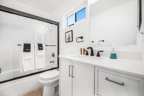 Hair dryer, towels, soap, shampoo