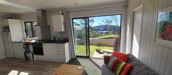 Itzy Bitzy house is colourful, cosy, fully fenced with sea views