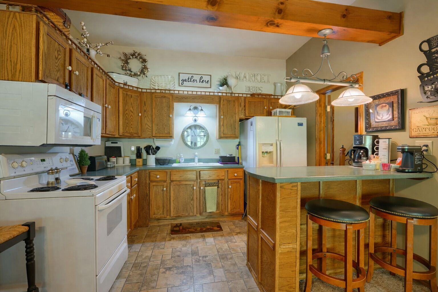 Coffee/tea maker, fridge, microwave, oven