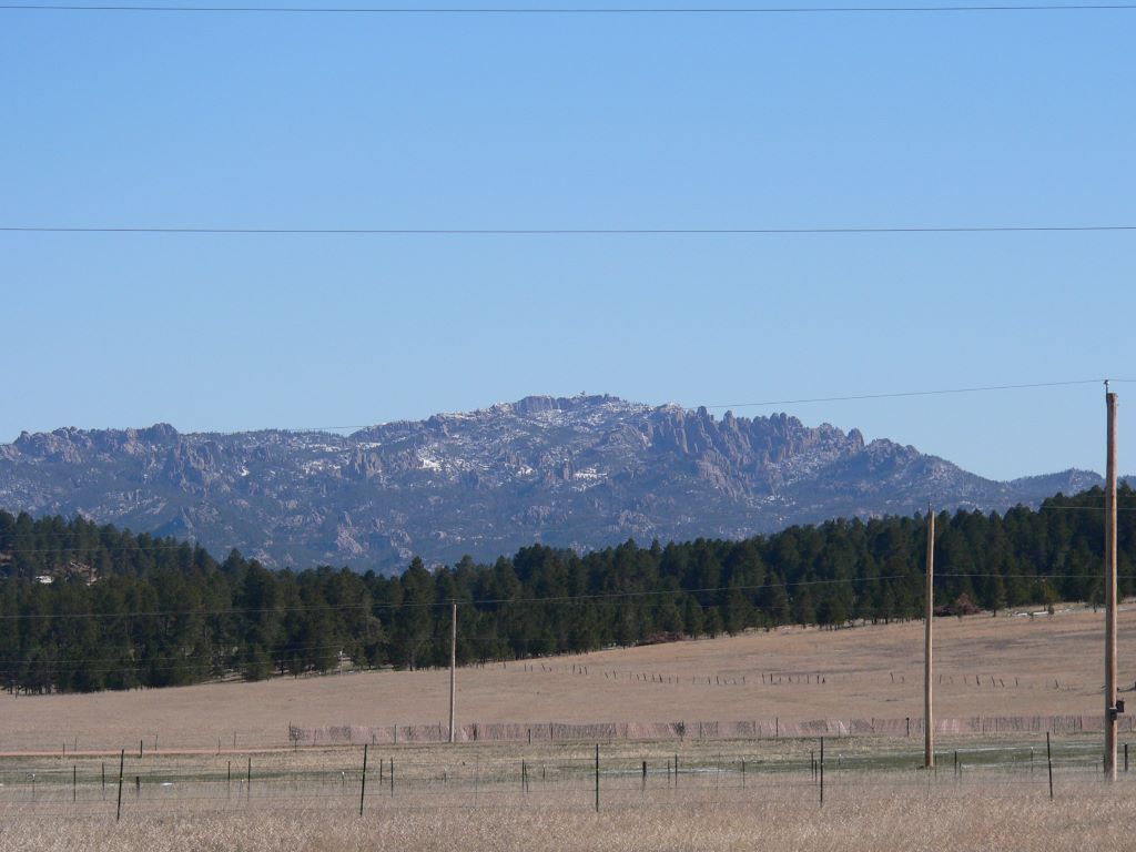 A mountainous landscape with a clear sky.