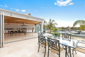 Outdoor dining - The Beach House: Waterfront with Boat Mooring (Patterson Lakes)