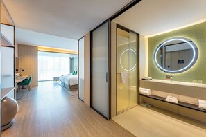 Premium Room, 1 King Bed (Smart Room, Living Area) | Bathroom | Shower, rainfall showerhead, slippers, towels