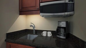 Fridge, microwave, coffee/tea maker, toaster