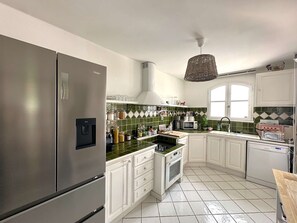 Fridge, microwave, toaster, cookware/dishes/utensils