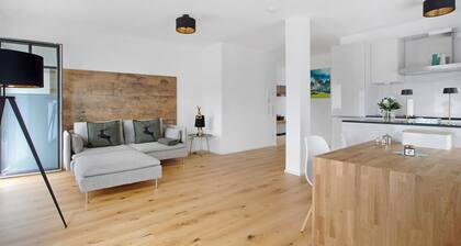 Appartement 'Design Ferienwohnung Am Chiemsee' avec terrasse privée, jardin privé et Wi-Fi