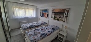 1 dormitorio, tabla de planchar con plancha, wifi gratis y ropa de cama