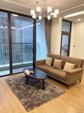 Departamento Deluxe, 2 habitaciones | Área de sala de estar