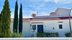 A white building with a red-tiled roof, a satellite dish, and a door labeled "5B". - La Novela - Calpe, Costa Blanca (Calpe)