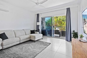 Apartment, 3 Bedrooms | Living area | 55-cm Smart TV with digital channels, Netflix, streaming services