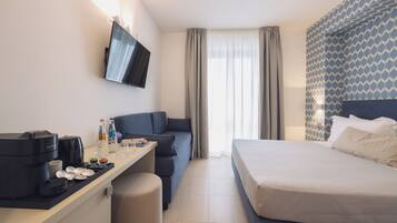 Deluxe Room | Premium bedding, minibar, in-room safe, blackout drapes