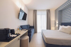 Ropa de cama de alta calidad y minibar 