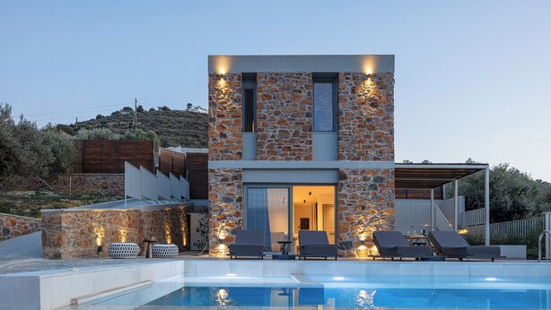 A modern building with a stone facade, a pool, and outdoor seating. - Kōa Villa II, Stylish villa Near Beach by etouri (Heraklion)